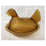 Amber Glass Hen on a Nest, 7"L, Rim Chip