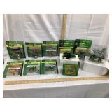 (12) NIB John Deere 1/64 Scale Toy Tractors
