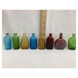 (8) Colored Embossed Bottles, (1) w/ Rim Chip,