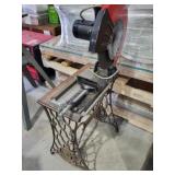 Chop saw on singer sewing machine base