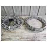 Rolls of conduit with wire inside