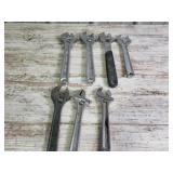 Adjustable wrenches