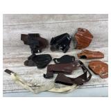 Assortment of leather holsters