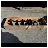Auger with attached drill bit Auger with attached drill bit