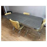 1950s Formica kitchen table with matching chairs.