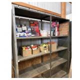 Metal shelving unit with contents.