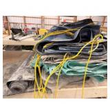 Tarps various colors with ropes.