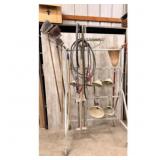 Rolling Tool Rack with Tools Brooms  Garden Rake