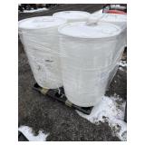 Skid of 4 plastic barrels empty