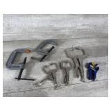 Table clamps and grips