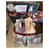 Totes of pillows blankets