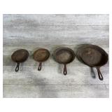 Four Cast Iron Skillets