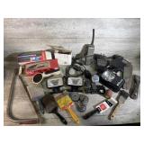 Radios, lights, paint brushes, saw