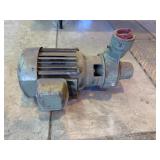 Electric motor with pump