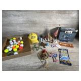 Golf balls, horse statue