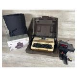 Typewriter, slippers, blanket