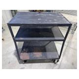 Rolling metal shelving unit