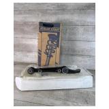 Control arm, gas charged replacement strut