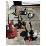 Three running weedeaters