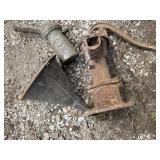 Old water pump, galvanized oil can and funnel