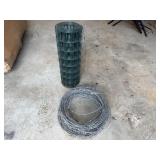 Wire Fence and Roll of Barbed Wire