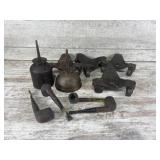 Antique oil cans, smoking pipes and carts