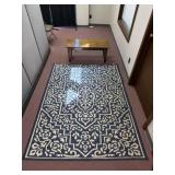 Indoor/ Outdoor Rug  approximately 6 X 8, Wood