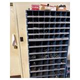 Storage bin full of pipe fittings