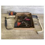 Assortment of Allen wrenches and tools
