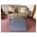 Couch with Rolling Footrest