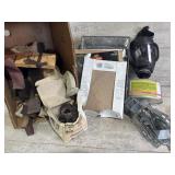 Gas mask, sandpaper, brushes