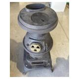 Antique cast iron pot-belly stove