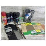 Drill bits, torch, sandpaper, spray paint