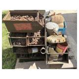 Skid of pipe fittings, washers