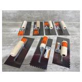 Wood and vinyl trowels new