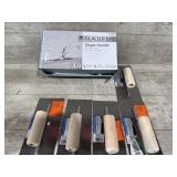 Faucet and carpet trowels