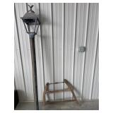 Cross saw and light post