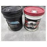 Bucket of Hy- trans ultra and bucket of traveler