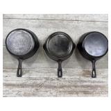 (3) unmarked #5 skillets