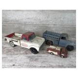 Three Toy Trucks