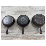 (3) unmarked #5 skillets