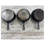 (3) unmarked skillets