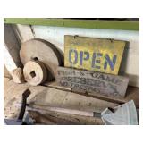Grinding stones, and signs
