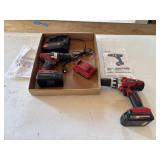 Tool shop drills with batteries and charger