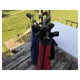Golf bags and clubs