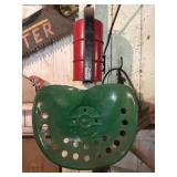 Tractor seat and vintage smudge pot road flare kit