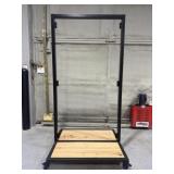Retail display stand featuring a black metal