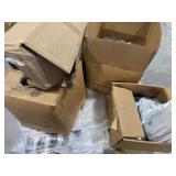 Skid of plastic caps rubber framers and bags