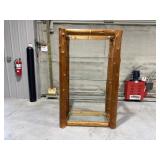 Rustic log and glass shelf, resembling handmade