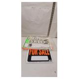 Assorted "For Sale" and "Garage Sale" Signs